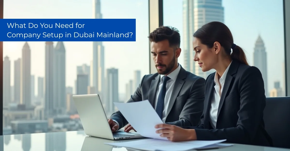 Image of two professionals working on a laptop and reviewing documents in a modern office with the Dubai skyline in the background.