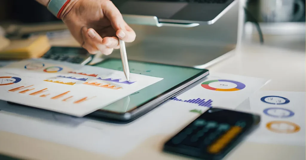 Business professional reviewing DMCC trade license cost documents.