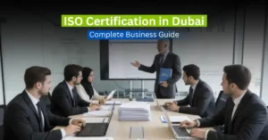 Corporate team reviewing ISO certification strategy in modern Dubai office.