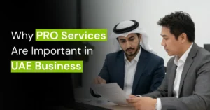 Business consultant assisting company owner with UAE government documentation in modern corporate office