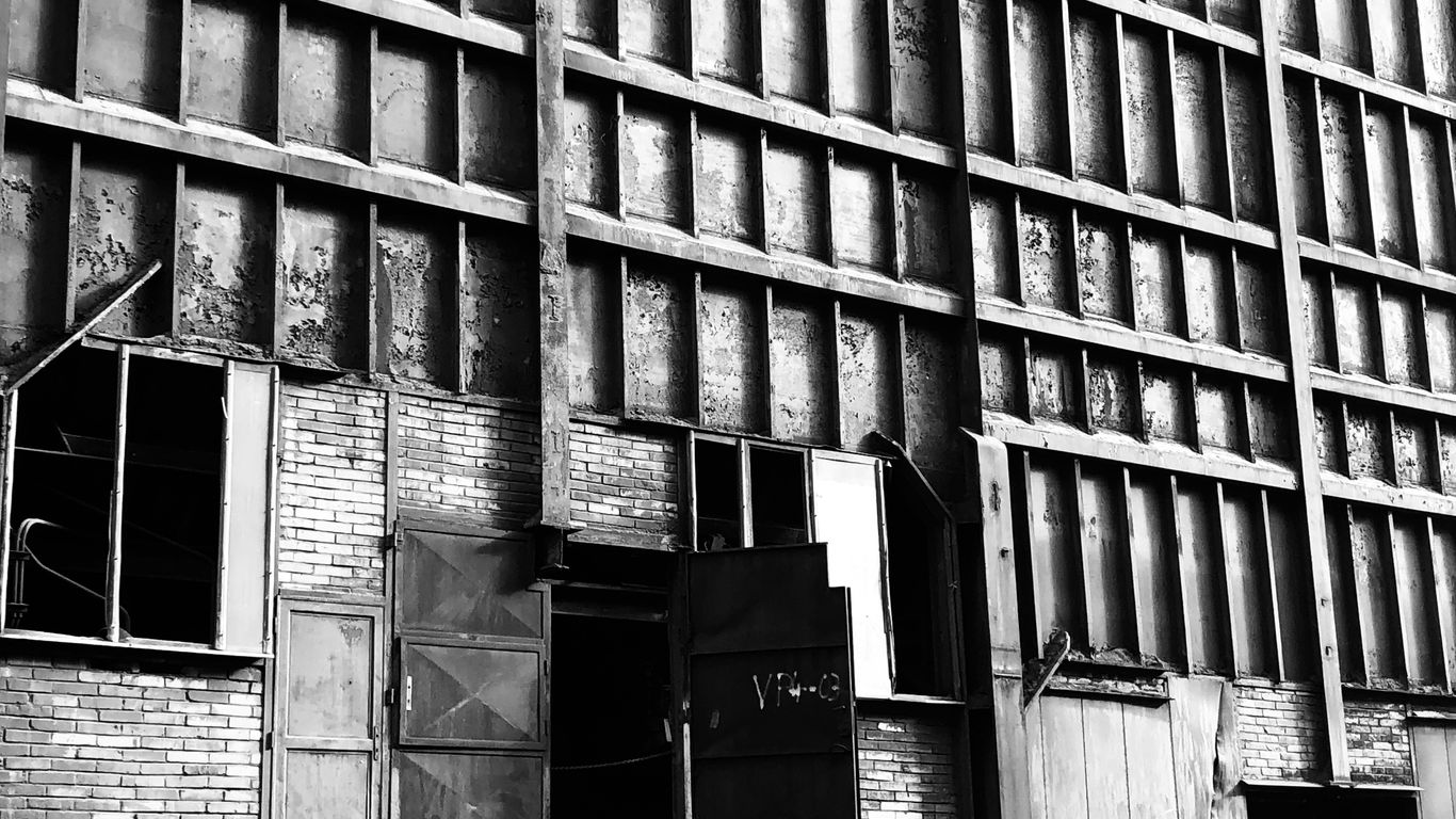 a black and white photo of an old building