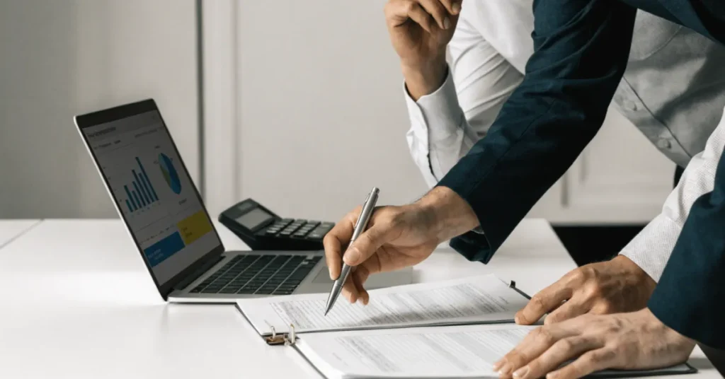 Business owner completing Corporate Tax UAE registration and compliance documentation with professional accounting support.